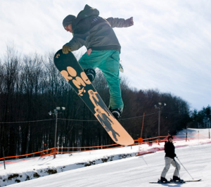 Snowboarder doing a trick.